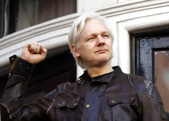 ecuador tells assange to speak carefully and take